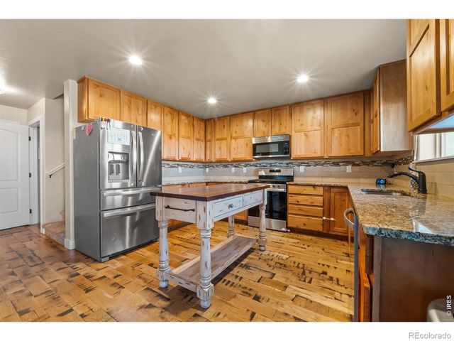 1110 Coyote Lane, Wiggins, CO 80654