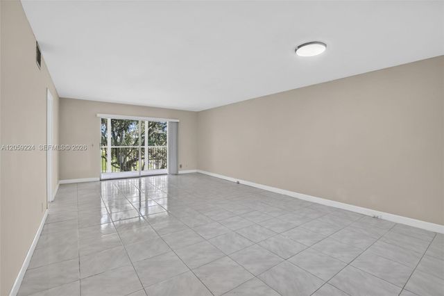 12800 SW 7th CT, 306G, Pembroke Pines, FL 33027