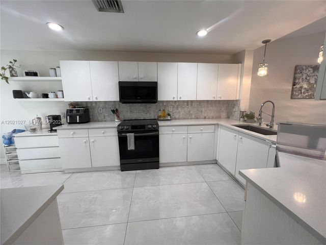 1590 Orion Ln, Weston, FL 33327