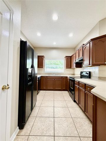 1144 ANDREW AVILES CIRCLE, Tampa, FL 33619
