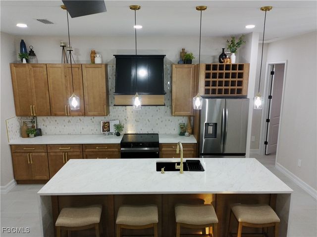 810 Sentinela BLVD, Lehigh Acres, FL 33974