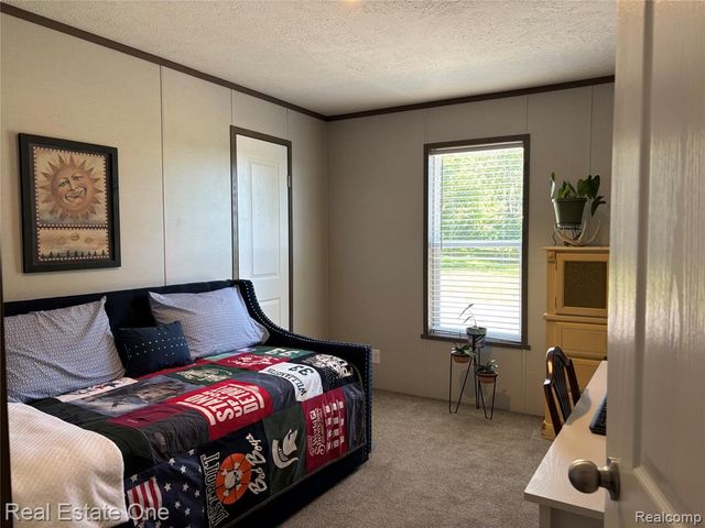 102 Sycamore, Highland, MI 48357