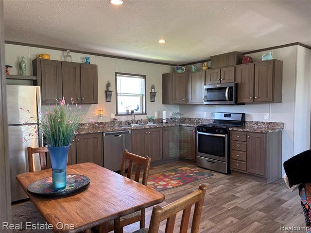 102 Sycamore, Highland, MI 48357