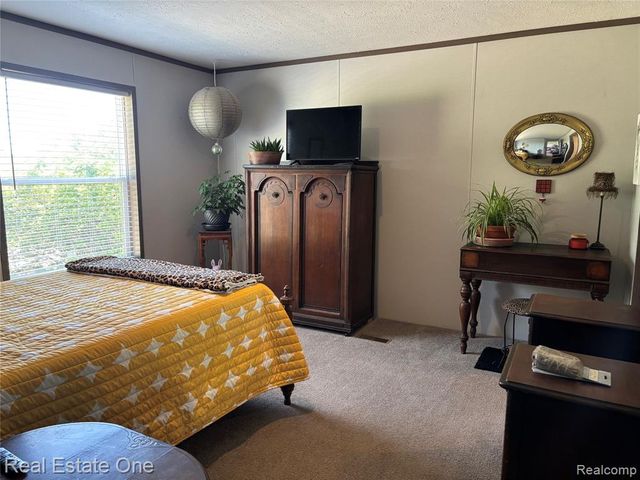 102 Sycamore, Highland, MI 48357