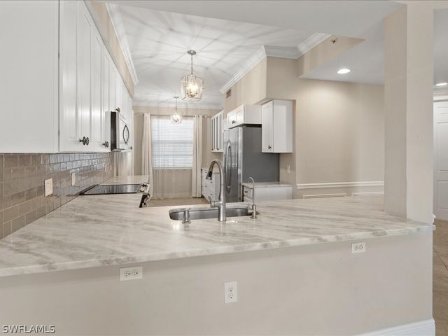 9719 Acqua CT 218, Naples, FL 34113