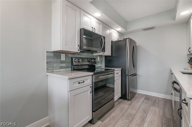 898 Buttonwood DR 105, Fort Myers Beach, FL 33931