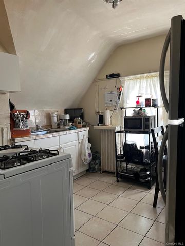 37-21 104th Street, Corona, NY 11368