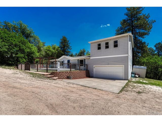 9306 S Curtis Rd, Larkspur, CO 80118