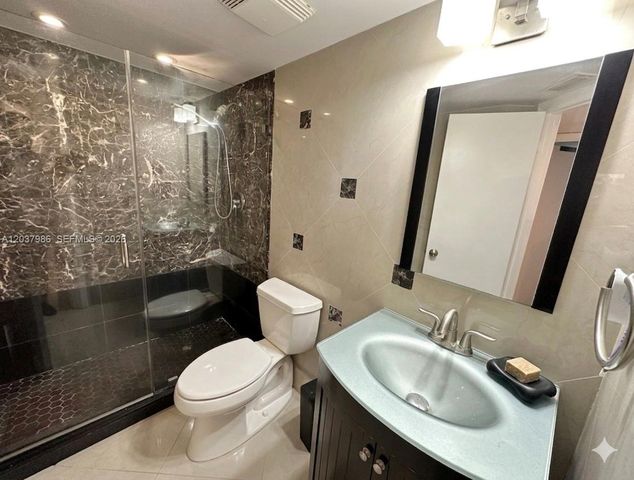 8955 Wiles Road 208, Coral Springs, FL 33067