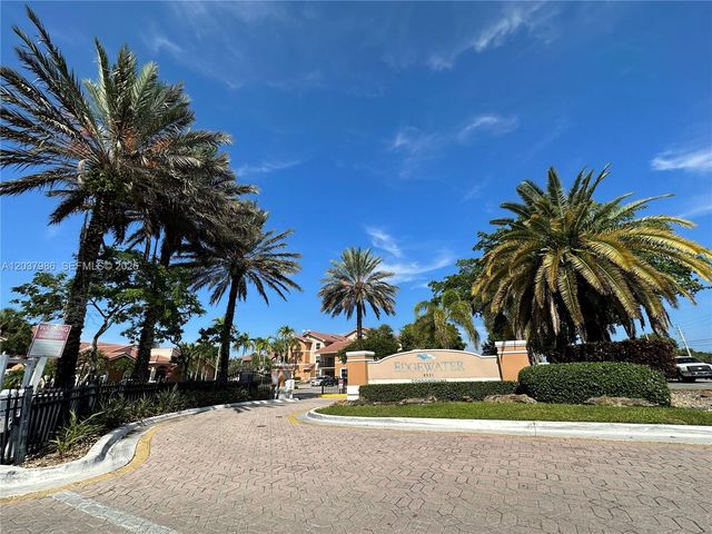 8955 Wiles Road 208, Coral Springs, FL 33067