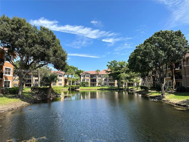 8955 Wiles Road 208, Coral Springs, FL 33067