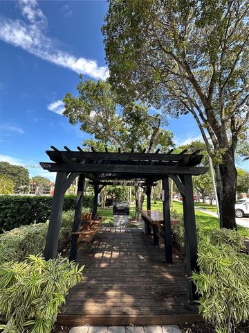 8955 Wiles Road 208, Coral Springs, FL 33067