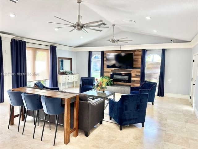 8955 Wiles Road 208, Coral Springs, FL 33067