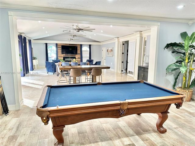 8955 Wiles Road 208, Coral Springs, FL 33067