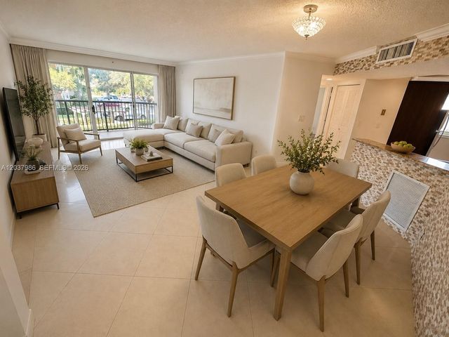 8955 Wiles Road 208, Coral Springs, FL 33067