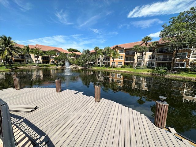 8955 Wiles Road 208, Coral Springs, FL 33067