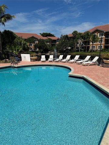 8955 Wiles Road 208, Coral Springs, FL 33067