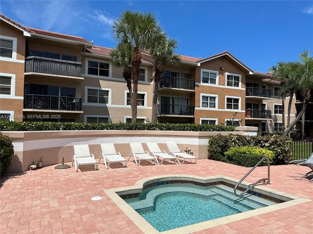 8955 Wiles Road 208, Coral Springs, FL 33067