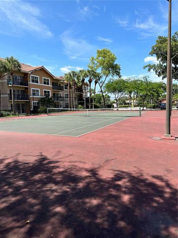 8955 Wiles Road 208, Coral Springs, FL 33067