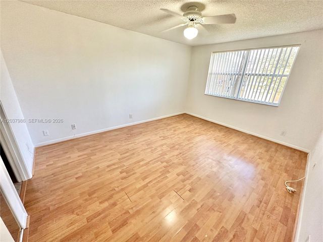 8955 Wiles Road 208, Coral Springs, FL 33067