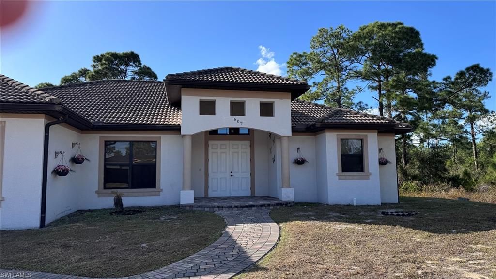 607 Johns AVE, LEHIGH ACRES, FL 33972 — exterior