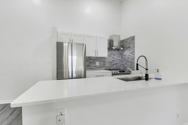 6392 Chasewood Drive F, Jupiter, FL 33458