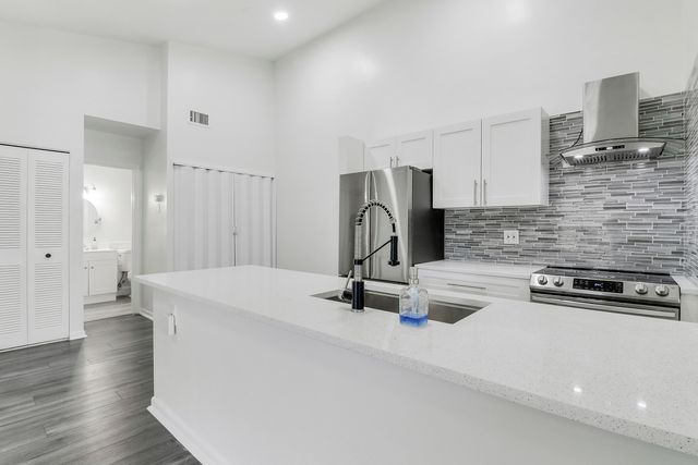 6392 Chasewood Drive F, Jupiter, FL 33458