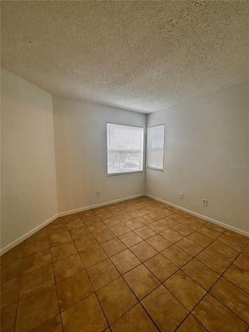 2504 WOODGATE BOULEVARD 202, Orlando, FL 32822