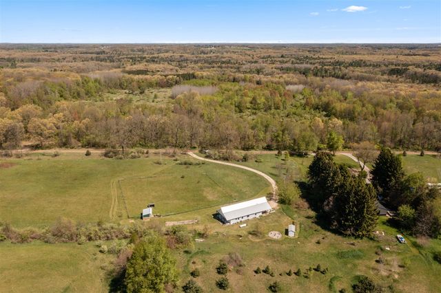 11117 W Snows Lake Road, Greenville, MI 48838