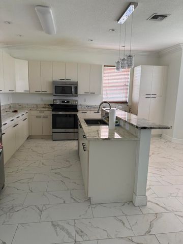 9960 Woodworth Court, Wellington, FL 33414