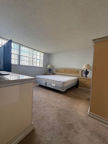 2430 DEER CREEK COUNTRY CLUB Boulevard 407-2, Deerfield Beach, FL 33442