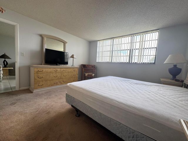 2430 DEER CREEK COUNTRY CLUB Boulevard 407-2, Deerfield Beach, FL 33442