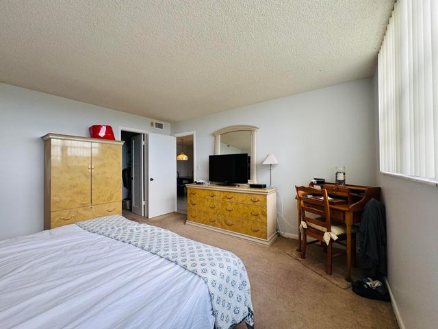 2430 DEER CREEK COUNTRY CLUB Boulevard 407-2, Deerfield Beach, FL 33442
