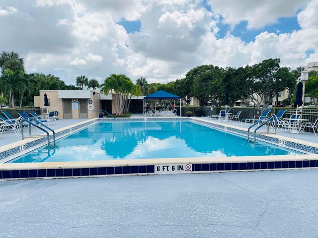 2430 DEER CREEK COUNTRY CLUB Boulevard 407-2, Deerfield Beach, FL 33442