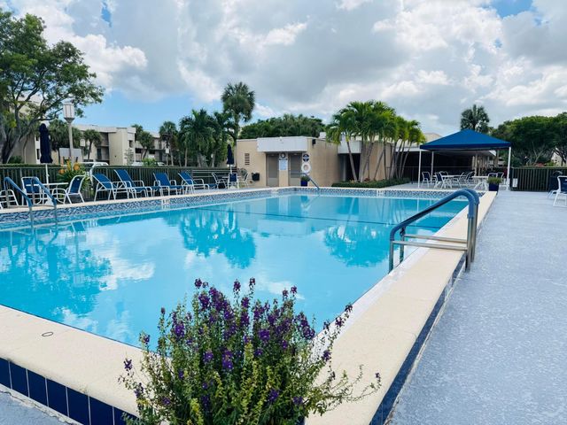 2430 DEER CREEK COUNTRY CLUB Boulevard 407-2, Deerfield Beach, FL 33442