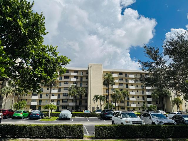 2430 DEER CREEK COUNTRY CLUB Boulevard 407-2, Deerfield Beach, FL 33442