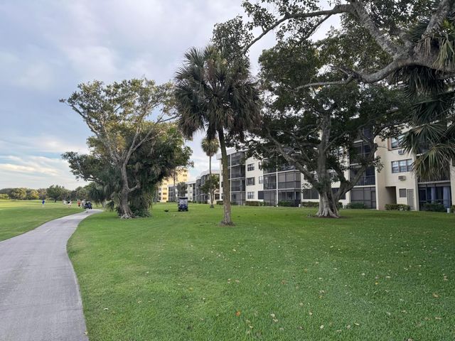 2430 DEER CREEK COUNTRY CLUB Boulevard 407-2, Deerfield Beach, FL 33442