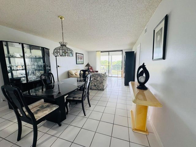 2430 DEER CREEK COUNTRY CLUB Boulevard 407-2, Deerfield Beach, FL 33442