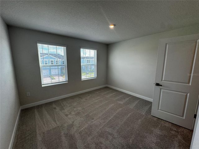 1197 PORT BLUE WAY, Lady Lake, FL 32159