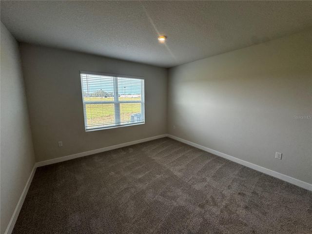 1197 PORT BLUE WAY, Lady Lake, FL 32159