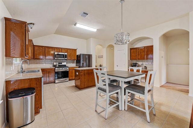 9830 Lynette Falls Drive, Houston, TX 77095