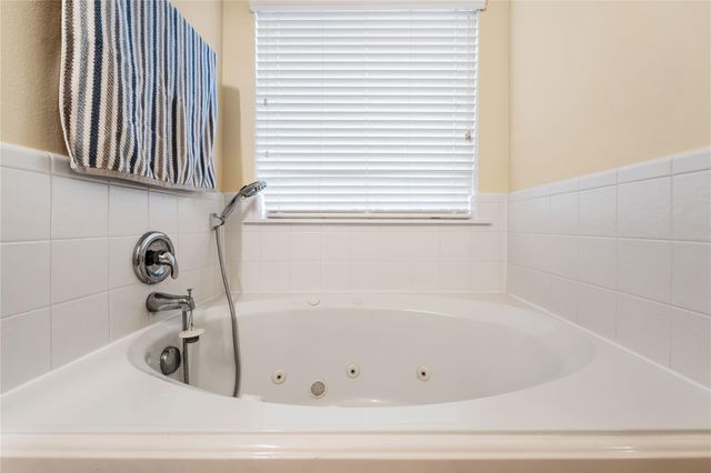 9830 Lynette Falls Drive, Houston, TX 77095