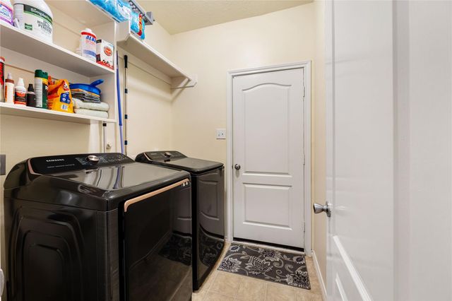 9830 Lynette Falls Drive, Houston, TX 77095