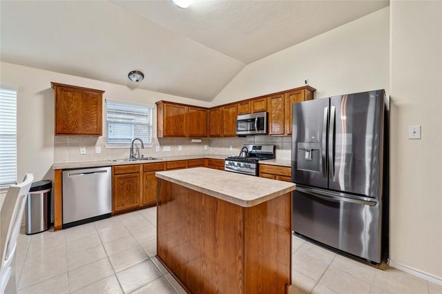 9830 Lynette Falls Drive, Houston, TX 77095