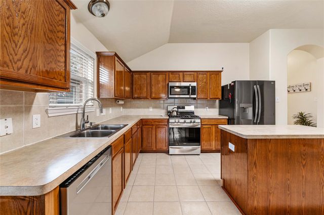 9830 Lynette Falls Drive, Houston, TX 77095