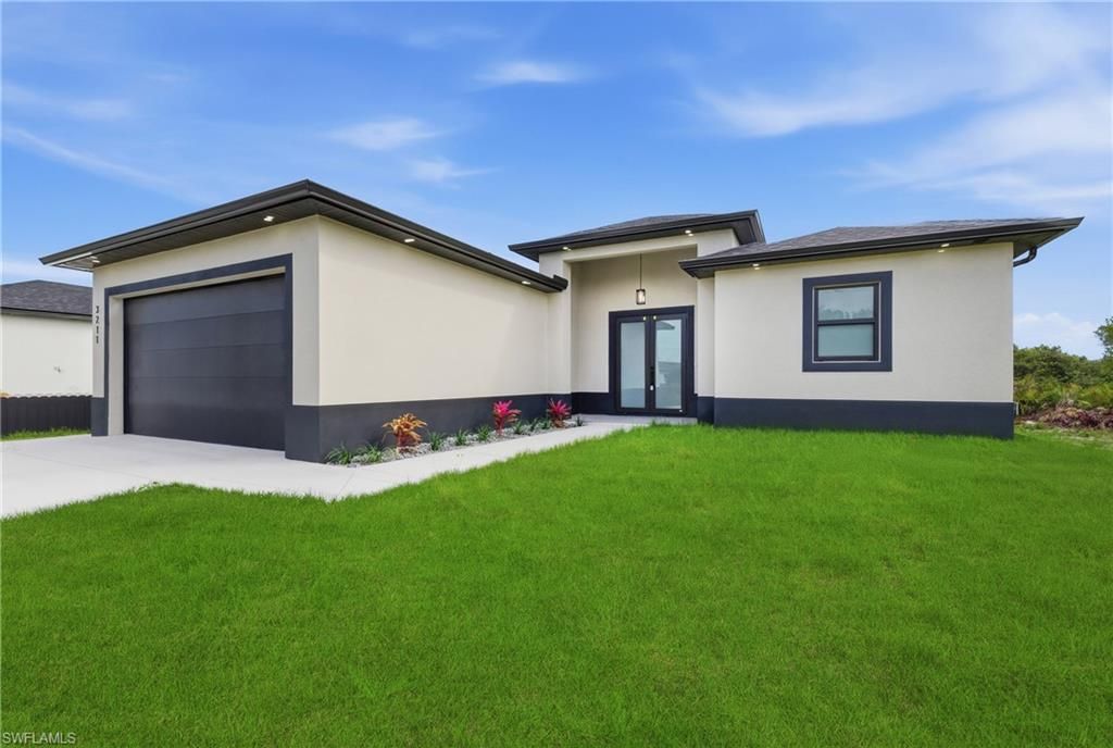 3211 6th ST SW, LEHIGH ACRES, FL 33976 — exterior