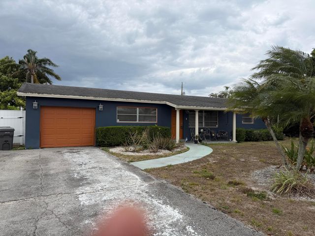 1674 Roy Drive, West Palm Beach, FL 33415