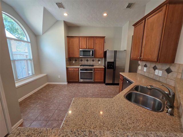 5221 Cottonwood Creek Lane, League City, TX 77573