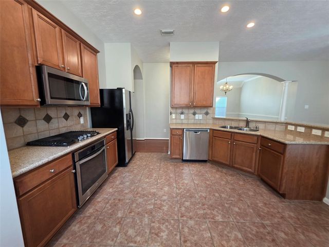 5221 Cottonwood Creek Lane, League City, TX 77573