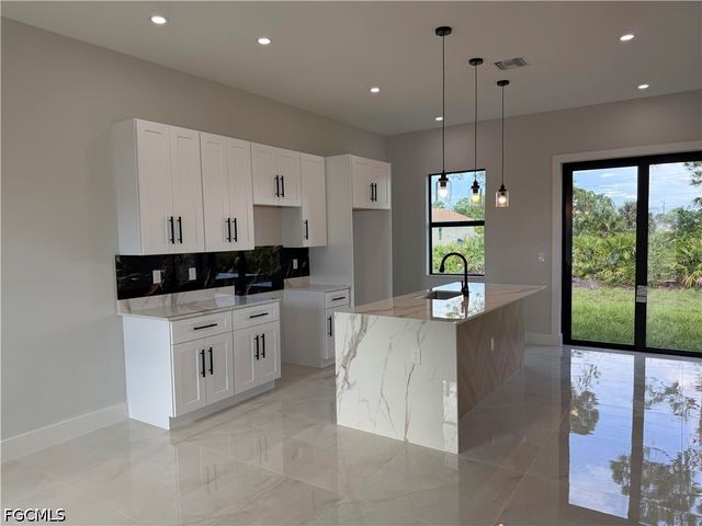 824 Dawhert AVE S, Lehigh Acres, FL 33974